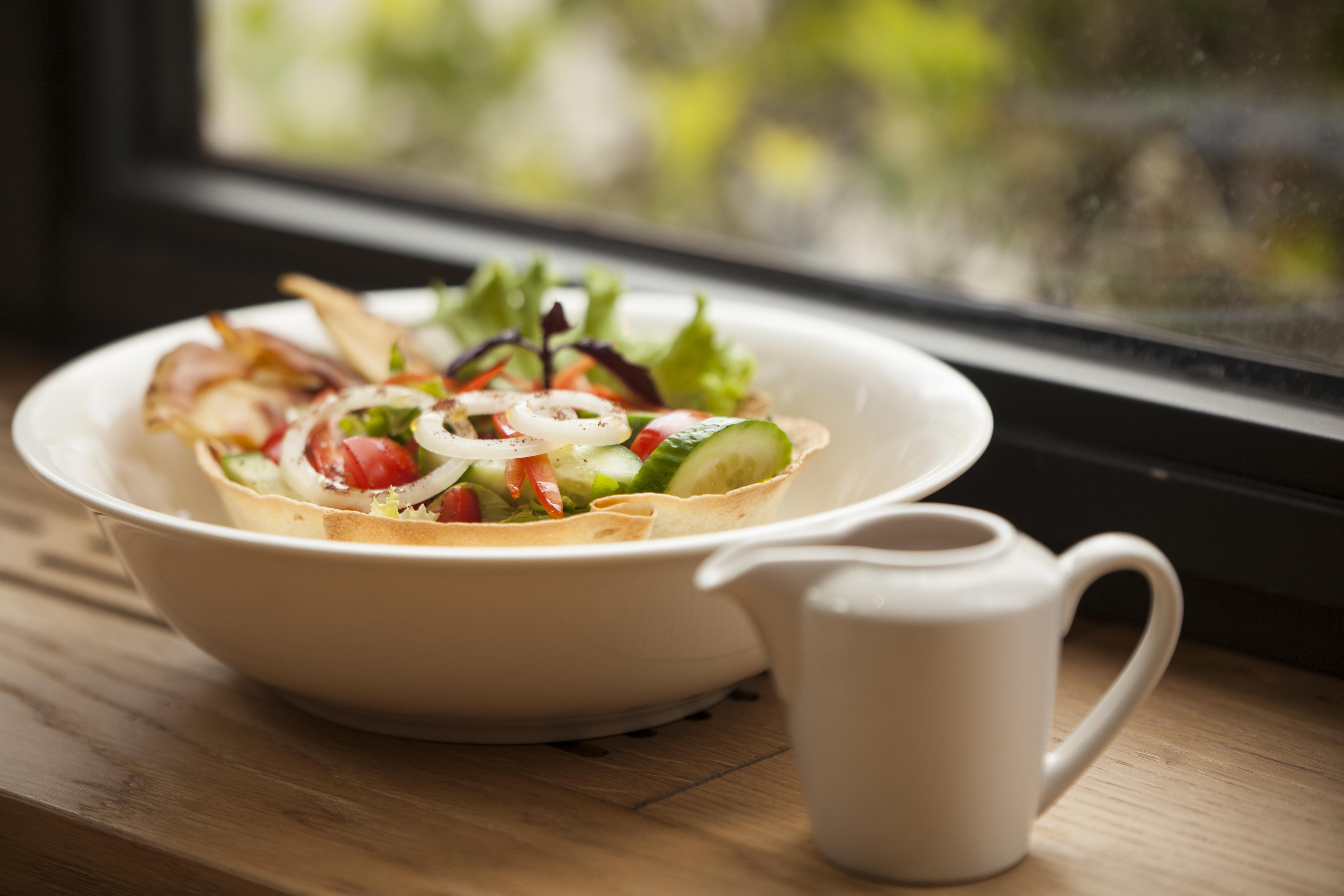 Grand Hotel Yerevan - Small Luxury Hotels Of The World Eksteriør billede A salad with a small jug of dressing